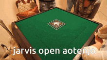 jarvis open aotenjo is written on the green table