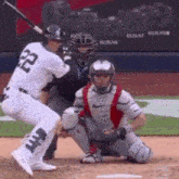 a baseball player with the number 22 on his jersey is swinging at a pitch