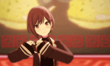 a girl with red hair and red eyes making a heart shape with her hands