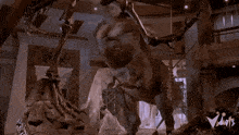a skeleton of a dinosaur is being displayed in a museum