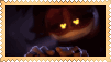 a close up of a pumpkin with glowing eyes in a dark room .