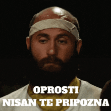 a man with a bandage on his head and the words oprosi nisan te pripozna on the bottom
