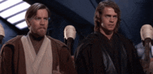 a couple of men standing next to each other in a room