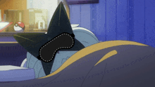 a cartoon character wearing a sleep mask is laying on a bed