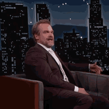 Laughing Naughty GIF - Laughing Naughty David Harbour GIFs