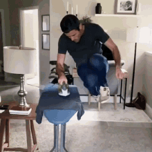 Ironing Daniel Labelle GIF - Ironing Daniel Labelle Pressing Clothes GIFs