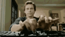 Jim Carrey Fast Typing GIF - Jim Carrey Fast Typing Speed Typing GIFs