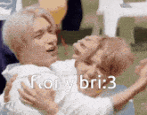 two men are hugging each other with the words flor y bri : 3