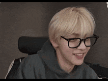 a person is sitting in front of a piano keyboard
