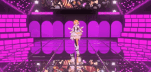 two anime girls are standing on a stage in front of a purple background with the word love on it
