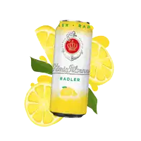 a can of konig pilsener radler surrounded by lemon slices and leaves
