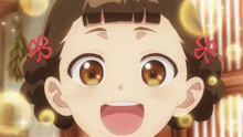 a close up of a girl 's face with a smile on her face