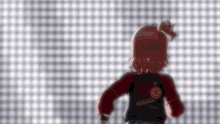 a girl wearing a red jacket that says love live on the back