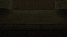 a group of people standing in a dark room with their shadows on the floor