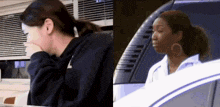 a woman in a black sweatshirt is crying next to a woman in a white car .