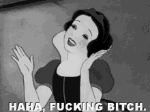 a black and white photo of snow white from snow white and the seven dwarfs with the caption " haha fucking bitch " .
