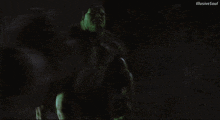 a hulk and a black hulk are fighting in a dark room with illusive soul written in the corner