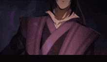 a man with long black hair is wearing a purple robe and a white shirt .