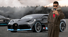 a man in a bathrobe takes a picture of a bugatti car