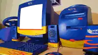 a blue and yellow hot wheels computer set with a keyboard and mouse