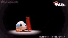 a stuffed animal is holding a barbell with the number 100 on it