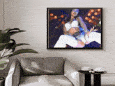 a framed painting of a woman is hanging on a wall
