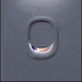 a woman 's face is visible through an airplane window