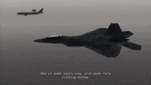 a fighter jet is flying next to a plane with the words we 've just seen one