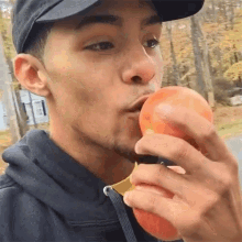 kelvin pena eating an apple biting in gala apples red delicious