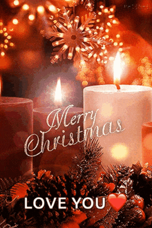 a merry christmas greeting card with candles and decorations
