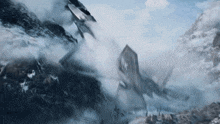 a plane is flying over a mountain with the letters nm on the side of it