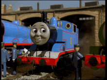 a blue toy train with the number 1 on it