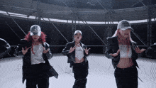 a woman wearing a hat that says make america great again is dancing