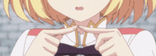 a close up of a girl 's neck and hands