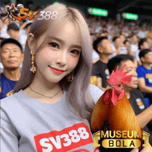 a woman holding a rooster wearing a shirt that says sv388 museum bola