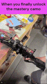a picture of a person holding a gun with a caption that says when you finally unlock the mastery camo