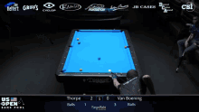 a pool table with a blue cloth that says diamond