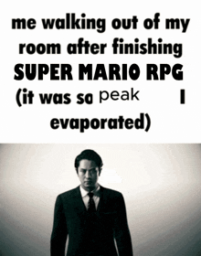a man in a suit and tie is walking out of a room