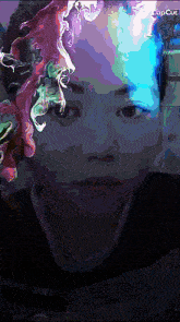 a colorful painting of a person 's face with the word copcut in the corner