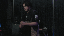 a man wearing a shirt with the number 2 on the front