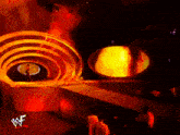 a wwe logo is on the floor of a stage
