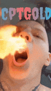 a man with flames coming out of his mouth and the word cptgold written above him