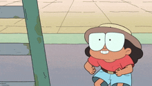a cartoon character wearing a hat and shorts is smiling