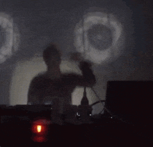 a blurry picture of a man playing a musical instrument