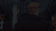 a man with horns on his head waves his hand