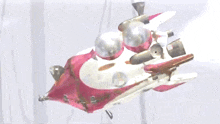 a pink and white airplane with a few bubbles on it