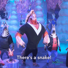 a group of zootopia characters are dancing in a room with the words " there 's a snake " written on the bottom