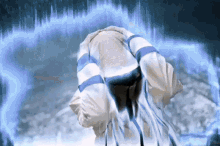 a person covering their head with a blue and white striped shirt