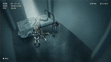 a video of a person laying on the floor with a time of 82.15.45