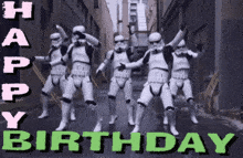 a group of stormtroopers are dancing on a street with the words happy birthday below them